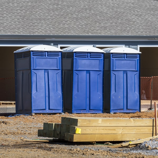 what is the cost difference between standard and deluxe portable restroom rentals in Stuart